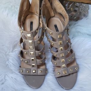 Used studed cage sandals